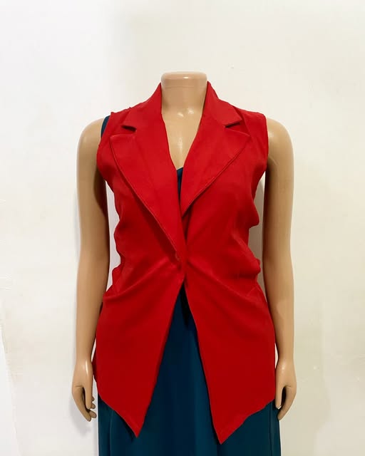 Red longline vest shown on a mannequin at TAG-her